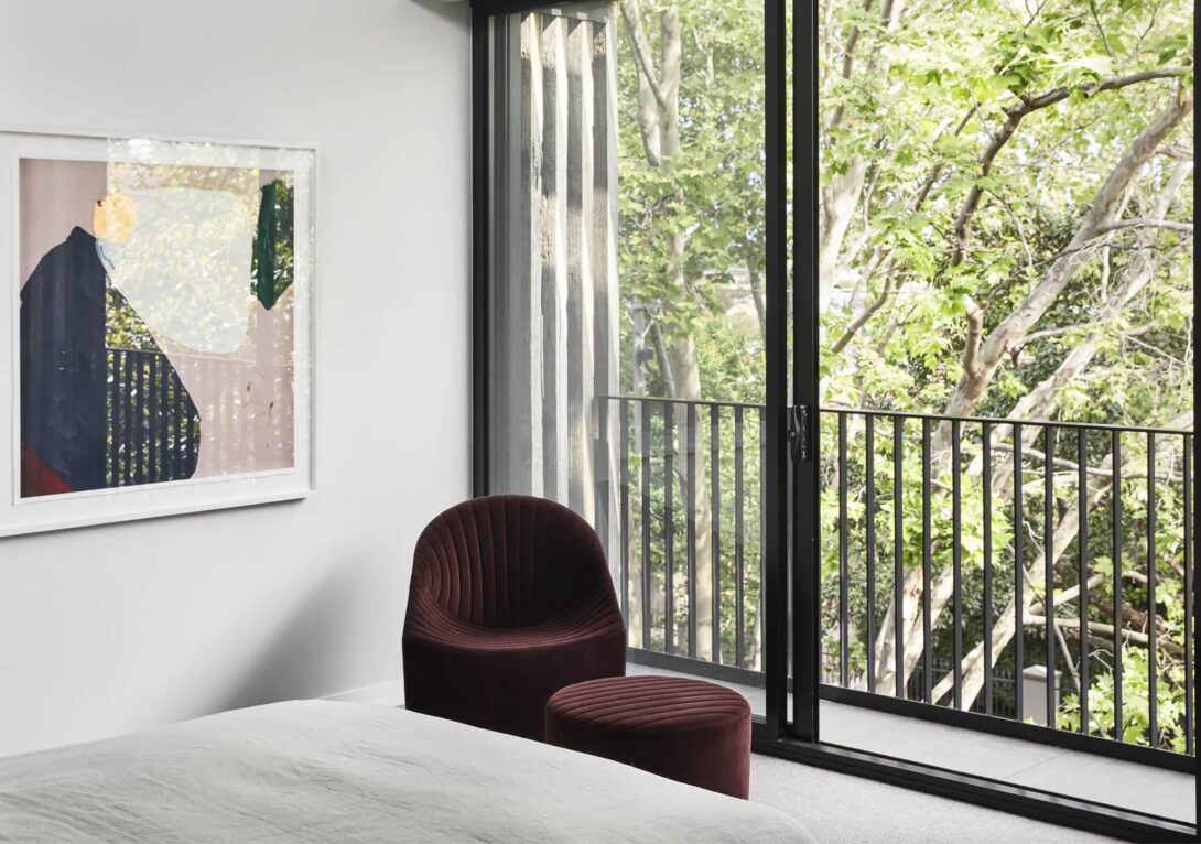 Oyster Armchair and Footstool in Velvet Chestnut