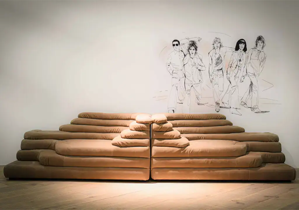 DS-1025 Terrazza Sofa featured beneath a mural of the Rolling Stones and Mick Jagger DOMO