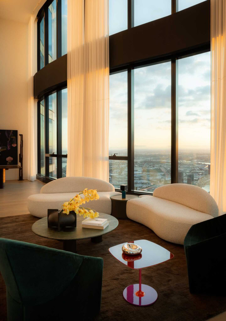 DOMO Penthouse living room Spin Sofa HC28 Oyster Armchair Asola Floor Lamp FURNISHD Luxury Interiors Southbank Melbourne Dylan James